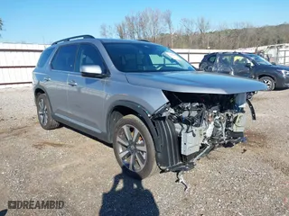 2025 Honda Pilot Touring with VIN 5FNYG1H71SB005461, listed as a IAAI auction lot 41441095 with 4,489 mi miles. Bid and sale history available at carsss.com. Image 1.