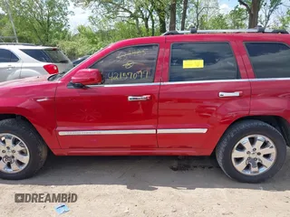 2009 Jeep Grand Cherokee with VIN 1J8HR68T79C539925, listed as a IAAI auction lot 42157077 with 140,443 mi miles and . Bid and sale history available at DreamBid. Image 13.
