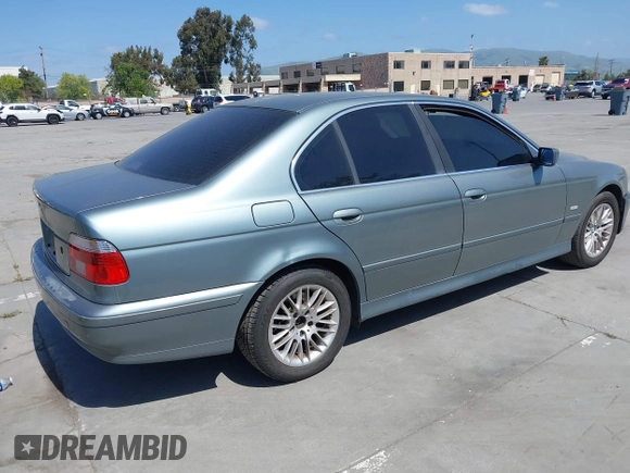 2003 BMW 5 Series 530iA with VIN WBADT63413CK33315, listed as a IAAI auction lot 42064612 with 205,426 mi miles. Bid and sale history available at carsss.com. Image 4.