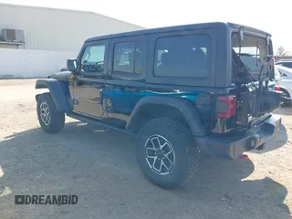 2024 Jeep Wrangler Rubicon with VIN 1C4PJXFG2RW276330, listed as a IAAI auction lot 41866339 with 23,168 mi miles. Bid and sale history available at carsss.com. Image 3.