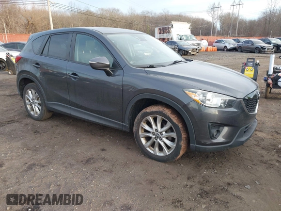2015 Mazda CX-5 Grand Touring with VIN JM3KE4DY5F0470445, listed as a IAAI auction lot 41236468 with 87,845 mi miles. Bid and sale history available at carsss.com. Image 1.