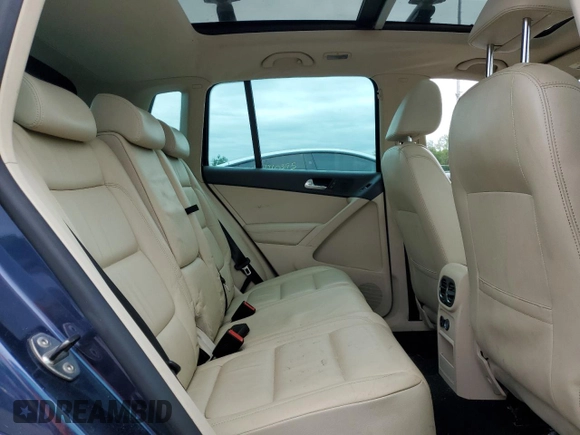 2011 Volkswagen Tiguan SEL z VIN WVGBV7AX2BW534482, wystawiony jako Copart lot #61097265 z przebiegiem 186 282 mil mil oraz Czysty tytuł • Clean title. Historia ofert i sprzedaży dostępna na DreamBid. Obrazek 11.