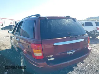 1999 Jeep Grand Cherokee Limited with VIN 1J4GW68N3XC770468, listed as a IAAI auction lot 41793600 with 65,277 mi miles. Bid and sale history available at carsss.com. Image 3.