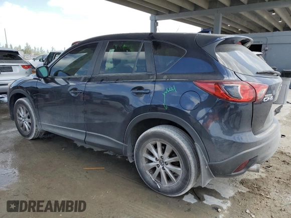 2016 Mazda CX-5 Touring with VIN JM3KE2CY9G0834048, listed as a Copart auction lot 54491535 with 116,328 mi miles and Salvage Title. Bid and sale history available at DreamBid. Image 2.