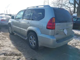 2003 Lexus GX 470 with VIN JTJBT20XX30015034, listed as a IAAI auction lot 41386690 with 234,983 mi miles. Bid and sale history available at carsss.com. Image 3.