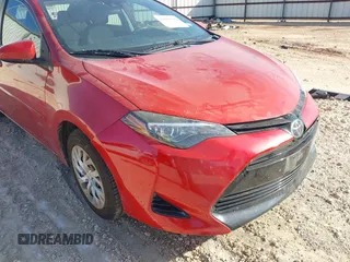 2018 Toyota Corolla L z VIN 5YFBURHE9JP790181, wystawiony jako IAAI lot #41982399 z przebiegiem 79 536 mil mil oraz . Historia ofert i sprzedaży dostępna na DreamBid. Obrazek 6.