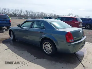 2005 Chrysler 300 with VIN 2C3JA43R45H616682, listed as a IAAI auction lot 41853835 with 158,464 mi miles. Bid and sale history available at carsss.com. Image 3.