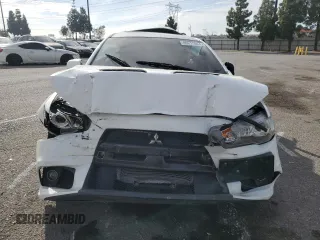 2014 Mitsubishi Lancer Evolution GSR with VIN JA32W8FV2EU019253, listed as a Copart auction lot 86615084 with 104,894 mi miles and Salvage Title. Bid and sale history available at carsss.com. Image 5.