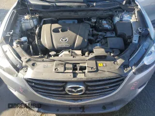 2016 Mazda CX-5 Sport with VIN JM3KE2BEXG0904597, listed as a Copart auction lot 86293834 with 63,343 mi miles and Salvage Title. Bid and sale history available at carsss.com. Image 12.