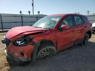 2016 Mazda CX-5 Sport with VIN JM3KE2BY2G0910324, listed as a Copart auction lot 56734615 with 148,256 mi miles and Salvage title. Bid and sale history available at DreamBid. Image 1.