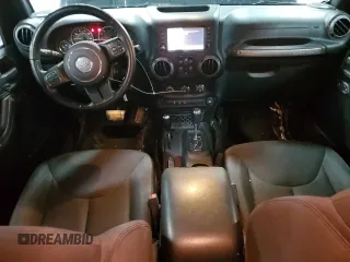 2016 Jeep Wrangler Unlimited Freedom с VIN 1C4BJWDG0GL158413, выставлен на аукционе Copart как лот 56829765 с пробегом 65 794 миль миль и Списание • Salvage title. История ставок и продаж доступна на DreamBid. Изображение 8.