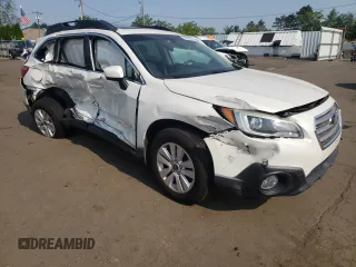 2015 Subaru Outback Premium with VIN 4S4BSADC1F3252517, listed as a Copart auction lot 59665585 with 94,533 mi miles and Salvage title. Bid and sale history available at DreamBid. Image 4.