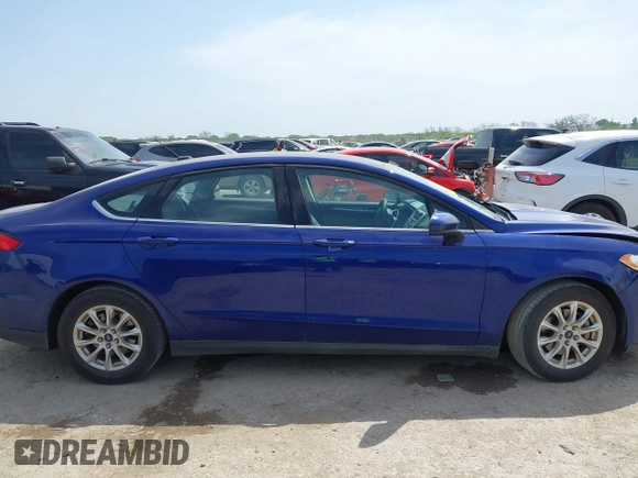 2016 Ford Fusion S z VIN 3FA6P0G7XGR263248, wystawiony jako IAAI lot #42020410 z przebiegiem 167 430 mil mil oraz . Historia ofert i sprzedaży dostępna na DreamBid. Obrazek 13.