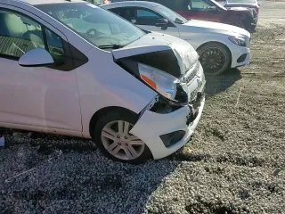 2015 Chevrolet Spark LS with VIN KL8CB6S97FC740974, listed as a Copart auction lot 86613484 with 72,401 mi miles and Salvage Title. Bid and sale history available at DreamBid. Image 11.