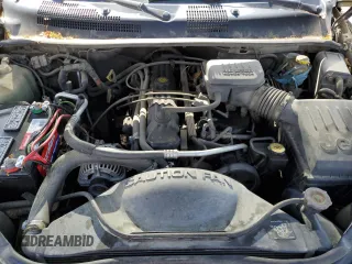 2000 Jeep Grand Cherokee Laredo with VIN 1J4GW48S6YC304447, listed as a Copart auction lot 58001035 with Not provided miles and Clean title. Bid and sale history available at DreamBid. Image 11.