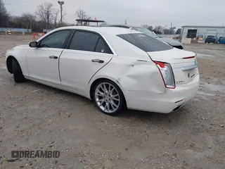 2014 Cadillac CTS Luxury AWD with VIN 1G6AX5S33E0156239, listed as a IAAI auction lot 41452922 with Not Provided miles and . Bid and sale history available at DreamBid. Image 3.