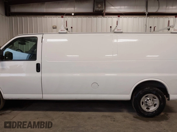 2017 Chevrolet Express Cargo Van with VIN 1GCWGBFF3H1186362, listed as a IAAI auction lot 41943220 with 163,229 mi miles. Bid and sale history available at carsss.com. Image 14.