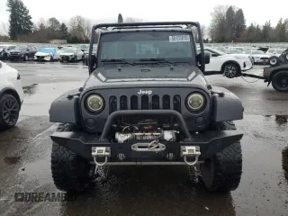 2008 Jeep Wrangler Unlimited Rubicon with VIN 1J4GA69188L642528, listed as a Copart auction lot 50103815 with 165,703 mi miles and Salvage Title. Bid and sale history available at carsss.com. Image 5.