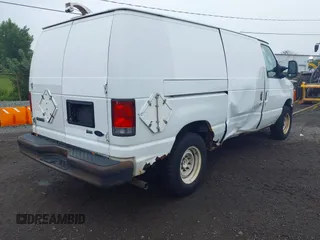 2010 Ford Econoline Cargo Commercial with VIN 1FTNE1EW8ADA91748, listed as a IAAI auction lot 42449221 with 190,616 mi miles and . Bid and sale history available at DreamBid. Image 4.