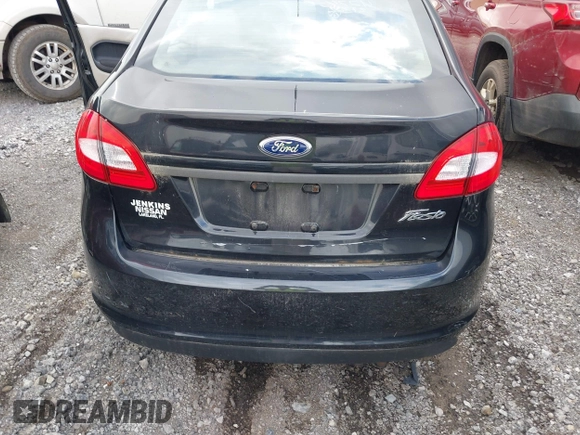 2013 Ford Fiesta S z VIN 3FADP4AJ5DM143885, wystawiony jako IAAI lot #42743132 z przebiegiem Nie podano mil oraz . Historia ofert i sprzedaży dostępna na DreamBid. Obrazek 6.