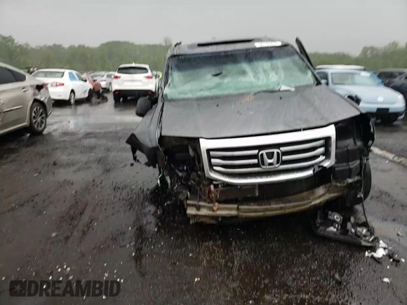 2013 Honda Pilot EX-L z VIN 5FNYF4H53DB072245, wystawiony jako Copart lot #56153435 z przebiegiem Nie podano mil oraz Szkoda całkowita • Salvage title. Historia ofert i sprzedaży dostępna na DreamBid. Obrazek 14.