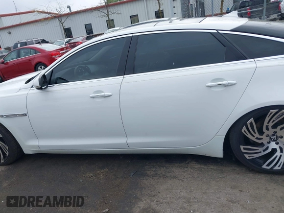 2013 Jaguar XJ Portfolio with VIN SAJWJ2GD3D8V48238, listed as a IAAI auction lot 40435160 with 136,738 mi miles and . Bid and sale history available at DreamBid. Image 14.