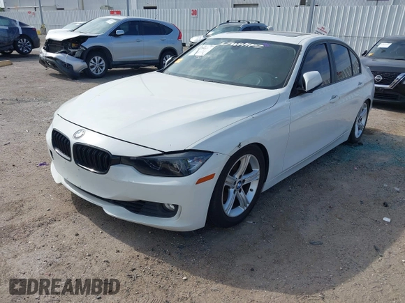 2012 BMW 3 Series 328i with VIN WBA3A5C53CF341664, listed as a IAAI auction lot 41991169 with 168,808 mi miles and . Bid and sale history available at carsss.com. Image 2.