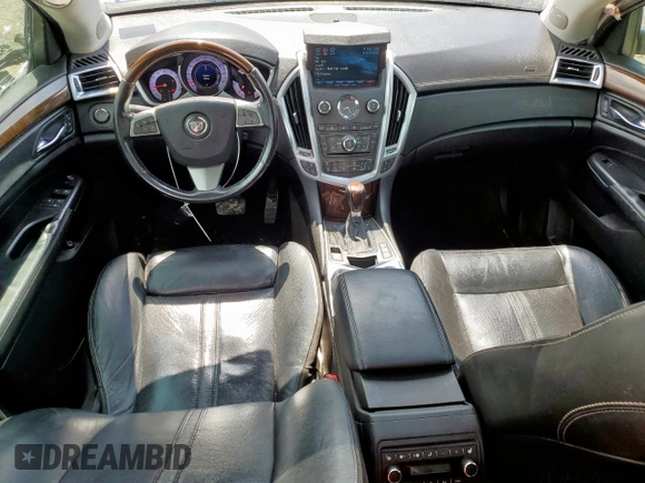 2012 Cadillac SRX Premium Collection z VIN 3GYFNCE39CS526425, wystawiony jako Copart lot #60557615 z przebiegiem 161 217 mil mil oraz Szkoda całkowita • Salvage title. Historia ofert i sprzedaży dostępna na DreamBid. Obrazek 8.