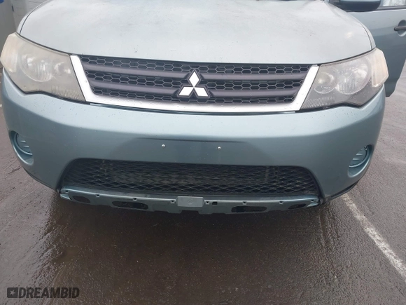2007 Mitsubishi Outlander ES with VIN JA4MS31X57U010562, listed as a IAAI auction lot 41446868 with 115,464 mi miles. Bid and sale history available at carsss.com. Image 6.