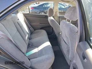2004 Toyota Camry LE with VIN 4T1BF30K94U577260, listed as a IAAI auction lot 41906287 with 68,499 mi miles. Bid and sale history available at carsss.com. Image 8.