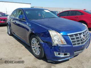 2012 Cadillac CTS Luxury with VIN 1G6DE5E59C0102621, listed as a IAAI auction lot 42554121 with 128,430 mi miles and . Bid and sale history available at DreamBid. Image 6.