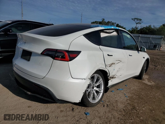 2021 Tesla Model Y Standard Range z VIN 5YJYGDED4MF107030, wystawiony jako Copart lot #66382913 z przebiegiem 39 024 mil mil oraz Szkoda całkowita • Salvage title. Historia ofert i sprzedaży dostępna na DreamBid. Obrazek 3.