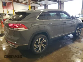 2021 Volkswagen Atlas SEL Premium z VIN 1V2TE2CA0MC220420, wystawiony jako Copart lot #56583215 z przebiegiem 27 662 mil mil oraz Szkoda całkowita • Salvage title. Historia ofert i sprzedaży dostępna na DreamBid. Obrazek 3.