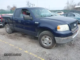 2005 Ford F-150 XLT with VIN 1FTPX12565NA61341, listed as a IAAI auction lot 41693609 with 401,988 mi miles. Bid and sale history available at carsss.com. Image 1.