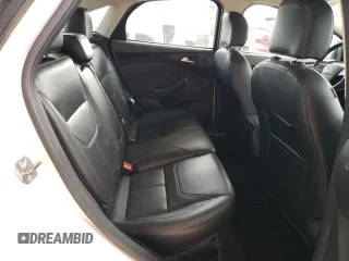 2018 Ford Focus Titanium с VIN 1FADP3J23JL246545, выставлен на аукционе Copart как лот 54838735 с пробегом 85 507 миль миль и Списание • Salvage title. История ставок и продаж доступна на DreamBid. Изображение 10.