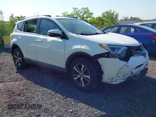 2016 Toyota RAV4 XLE with VIN JTMRFREV6GJ092749, listed as a IAAI auction lot 42394791 with 102,411 mi miles and . Bid and sale history available at DreamBid. Image 1.