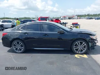 2019 Acura TLX Technology z VIN 19UUB2F43KA010490, wystawiony jako IAAI lot #42382271 z przebiegiem 40 892 mil mil oraz . Historia ofert i sprzedaży dostępna na DreamBid. Obrazek 14.