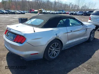 2016 Ford Mustang EcoBoost Premium with VIN 1FATP8UH1G5325654, listed as a IAAI auction lot 41879221 with 90,210 mi miles and . Bid and sale history available at carsss.com. Image 4.