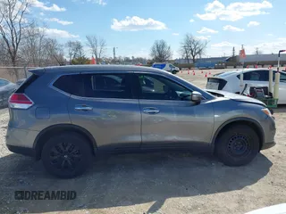 2015 Nissan Rogue S with VIN KNMAT2MVXFP527878, listed as a IAAI auction lot 41864389 with 87,305 mi miles and . Bid and sale history available at DreamBid. Image 13.