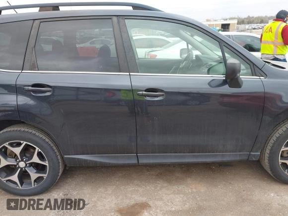 2015 Subaru Forester 2.0XT Premium with VIN JF2SJGDC1FH823888, listed as a IAAI auction lot 41829859 with 90,743 mi miles. Bid and sale history available at carsss.com. Image 14.