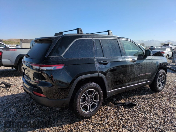 2022 Jeep Grand Cherokee Trailhawk with VIN 1C4RJHCG1N8574207, listed as a Copart auction lot 52789925 with 31,549 mi miles and Salvage title. Bid and sale history available at DreamBid. Image 3.