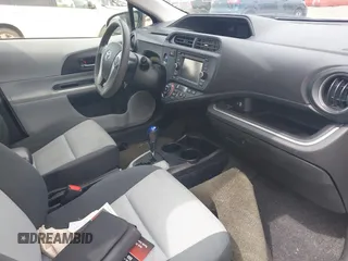 2014 Toyota Prius One with VIN JTDKDTB32E1074592, listed as a IAAI auction lot 42078851 with Not Provided miles and . Bid and sale history available at DreamBid. Image 5.