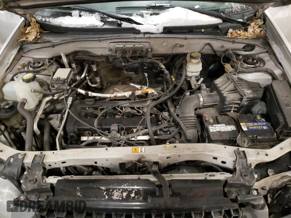 2007 Ford Escape XLS with VIN 1FMCU92Z77KA84801, listed as a Copart auction lot 82052144 with 180,774 mi miles and Salvage title. Bid and sale history available at DreamBid. Image 12.