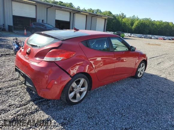 2013 Hyundai Veloster w/Black Int with VIN KMHTC6AD2DU126699, listed as a Copart auction lot 57329805 with 85,303 mi miles and Salvage title. Bid and sale history available at DreamBid. Image 3.