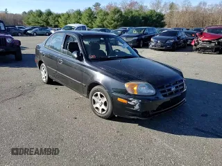 2005 Hyundai Accent GLS z VIN KMHCG45C15U662362, wystawiony jako Copart lot #80574774 z przebiegiem 122 898 mil mil oraz Szkoda całkowita • Salvage title. Historia ofert i sprzedaży dostępna na DreamBid. Obrazek 10.