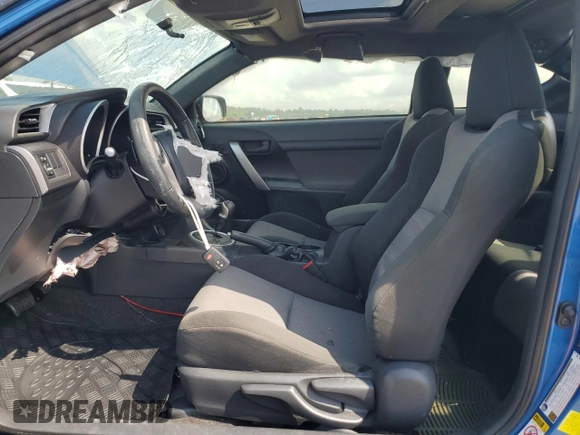 2016 Scion tC z VIN JTKJF5C78GJ016405, wystawiony jako Copart lot #54265995 z przebiegiem 89 467 mil mil oraz Szkody całkowita. Historia ofert i sprzedaży dostępna na DreamBid. Obrazek 7.