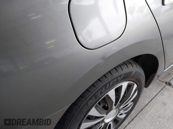 2015 Nissan Sentra S with VIN 3N1AB7AP9FY256920, listed as a IAAI auction lot 41491292 with 163,404 mi miles and . Bid and sale history available at DreamBid. Image 6.