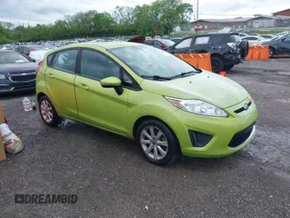 2013 Ford Fiesta SE with VIN 3FADP4EJ7DM136723, listed as a IAAI auction lot 42090284 with 168,004 mi miles. Bid and sale history available at carsss.com. Image 1.