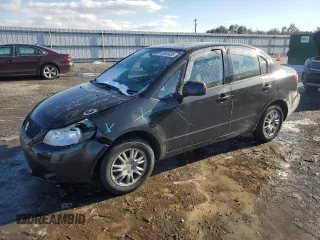 2012 Suzuki SX4 LE with VIN JS2YC5A3XC6303083, listed as a Copart auction lot 89265635 with 155,316 mi miles and Salvage Title. Bid and sale history available at carsss.com. Image 1.