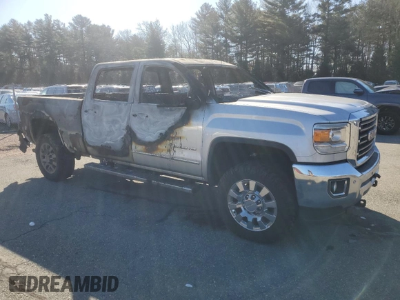 2015 GMC Sierra 2500HD SLT with VIN 1GT12ZEG1FF124518, listed as a Copart auction lot 48487725 with Not provided miles and Clean title. Bid and sale history available at DreamBid. Image 4.